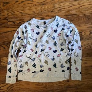 Grey sweatshirt with printed designs